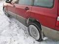 Subaru Forester in snow, get two wheels off the ground