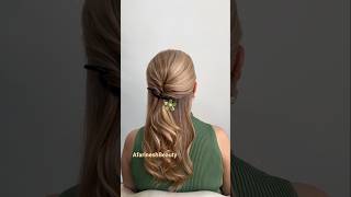 Elegant Updo-Down Twist Hairstyle With Green Floral Clip