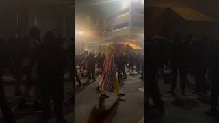 Demonstrators Do The Cha Cha Slide Outside Portland Ice Facility.