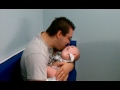 Daddy's beard tickles baby's belly