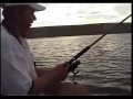 Carp fishing on lite tackle from a boat.