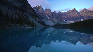 Mountains Reflection In Pristine Moraine Lake