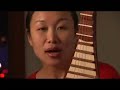 Liu Fang demonstrates the pipa techniques on a CBC TV documentary
