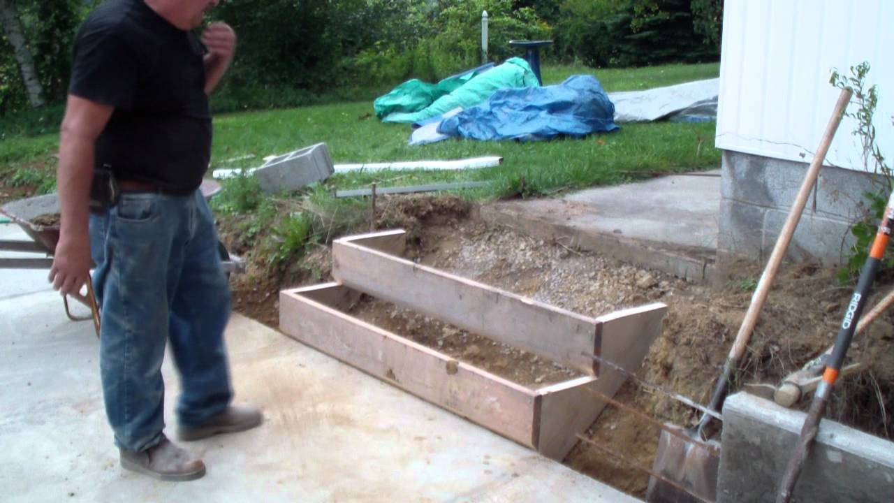 Forming a set of cement steps, (part two) - YouTube