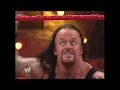 Big Show and Booker T interrupt a match between John Cena and The Undertaker