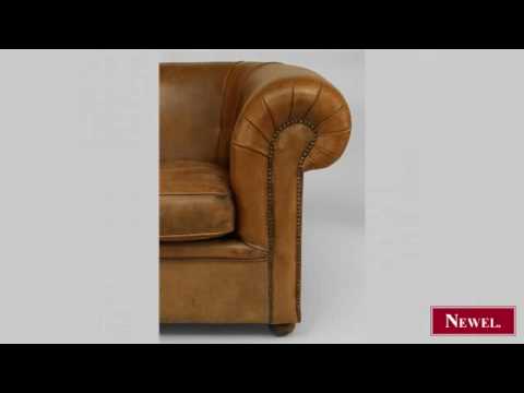 style large brown leather club chairs with brass nail head trim