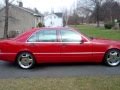 Red Mercedes Benz S500 W140 S-Class pulling out of drive with 19 Chrome