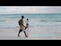 Vacation - swimming in Cancun in red pants and white top