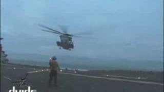 U S Navy Sailors From The Uss Kearsarge Prepare Humanitarian Aid To Haiti