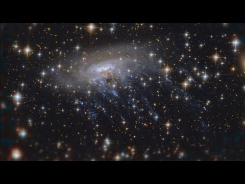 Hubble captures incredible image of galaxy being ripped apart Hubble captures incredible image of galaxy being ripped apart klip izle
