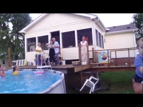 Bride and Bridesmaid jumped into pool