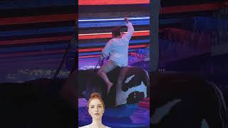 Mechanical Bull Riding 4K - Brave Blonde Girl In Dress In Benidorm