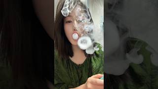 Girl Smoking Vape Ring
