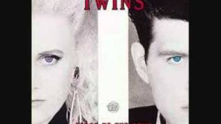 Watch Thompson Twins Dancing In Your Shoes video