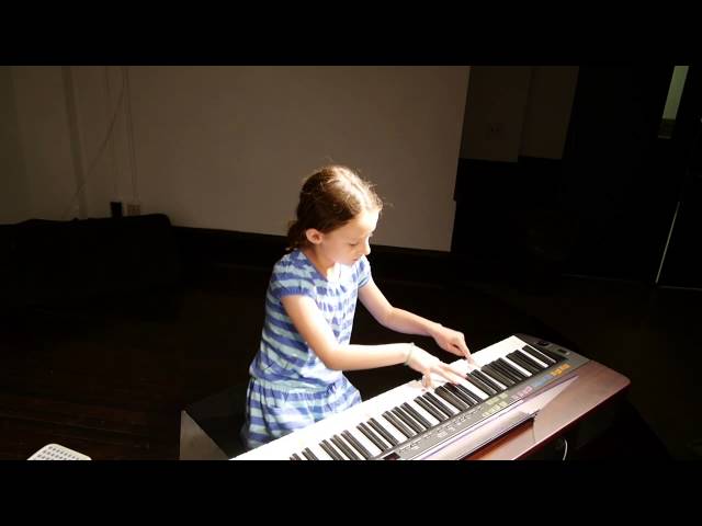 Clemmy (8) plays Wild Appaloosa on piano at Spring Recital 2014