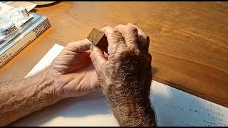 Rod showing a Boulder Opal piece