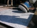 Marble floor polishing method - by slurry