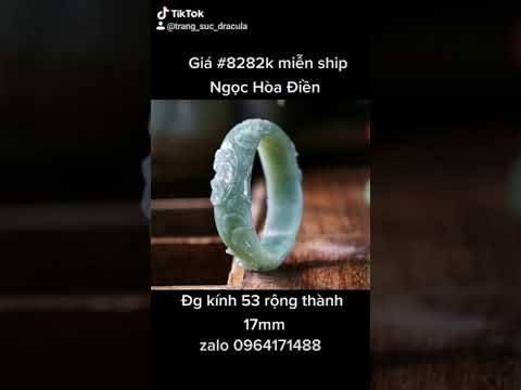 Vòng tay ngọc hòa điền khắc hoa có kèm kiển định