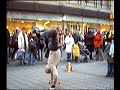 Old man doing turtle freeze on a bottle