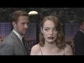 La La Land gala: Ryan Gosling creeps up on Emma Stone!