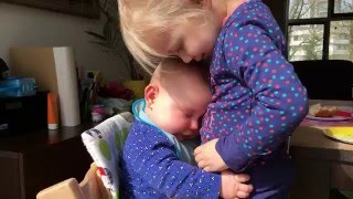 This Baby Cuddling With Her Sister Will Melt Your Heart This Baby Cuddling With Her Sister Will Melt Your Heart