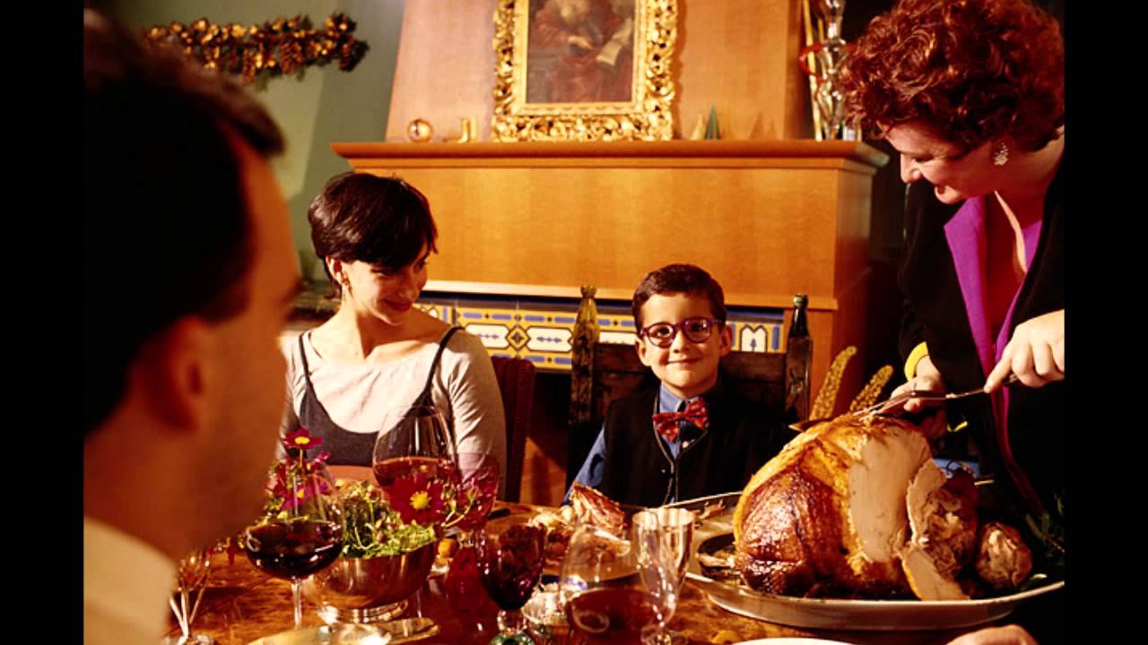 Cousin blowing thanksgiving table