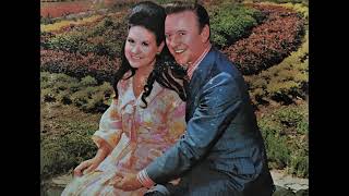 Watch Kitty Wells God Put A Rainbow In The Cloud video