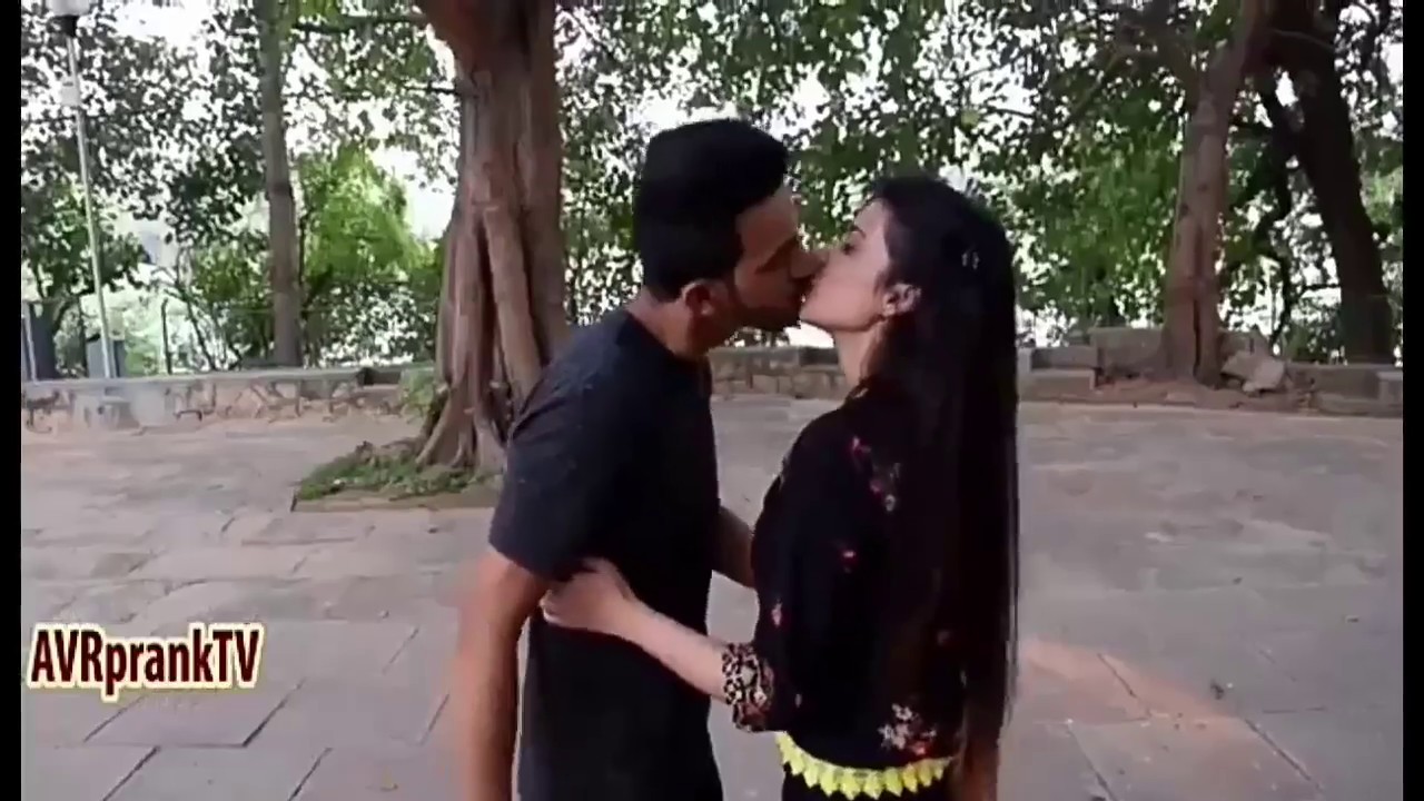 Indian friends hanging girl kisses boyfriend