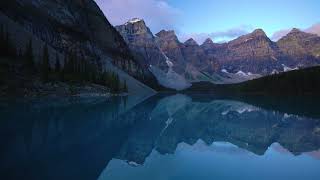 Mountains Reflection In Pristine Moraine Lake