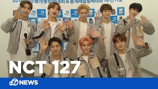 Backstage with K-Pop band NCT 127 and watch 'Simon Says'