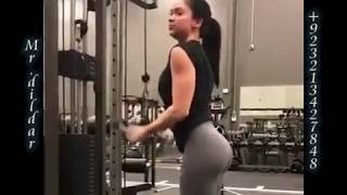 Beautiful girl gym workout in tights in home