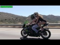 Видео A Sexy Girl in black tank top riding on a Sportbike on the freeway