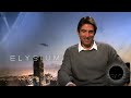 Elysium's Badass Bounty Hunter: Sharlto Copley | Exclusive Video