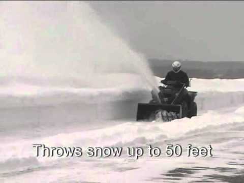ATV Snow Thrower in action