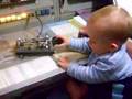 Title:Morse Code Description:Léo got to play with Grandpa's key...and he seems to already have the hang of it!