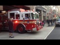 FDNY ENGINE 54, GIVES A WAVE, WHILE RESPONDING FROM IT'S QUARTERS ON W. 48TH ST. IN MANHATTAN, NYC.