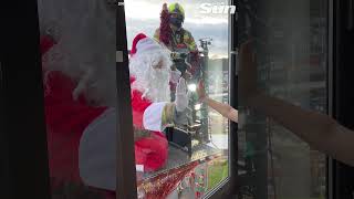 Santa swaps sleigh for CRANE to visit children in hospital #Shorts 🎅🏼 🎄