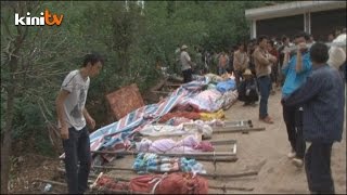 Bundles of cloth wrap brutality of Chinese earthquake