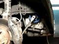 How to use a breaker bar to remove a crank pulley bolt on a passenger facing, clockwise engine.