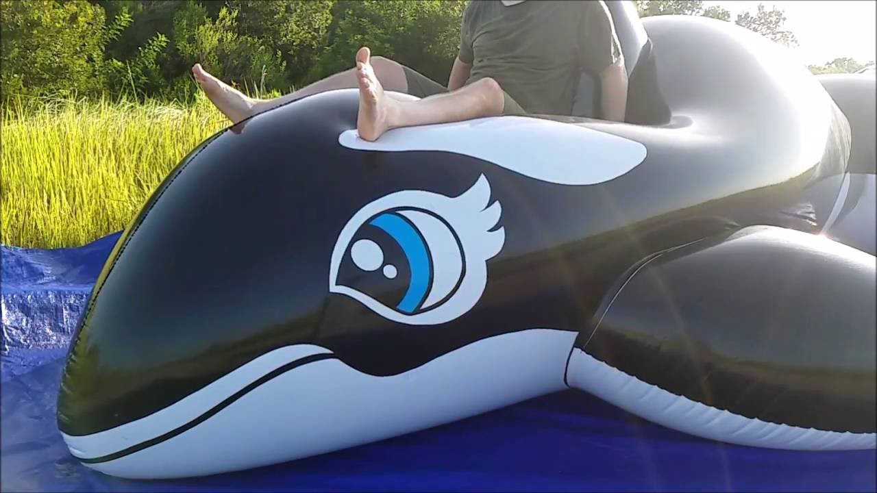 Girl humping inflatable whale