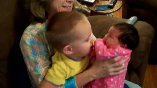 Autistic 2 year old meets his newborn sister (Barking dog NOT ours! Please ignore) Autistic 2 year old meets his newborn sister (Barking dog NOT ours! Please ignore)