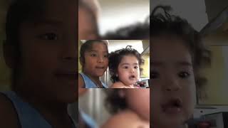 Little Girl Picks Baby Sister Up By Head For Video