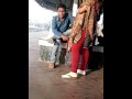 Punjabi Couple Waiting At Railway Station