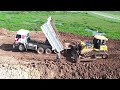 Best Technology Land Filling Up Road Construction Over Lake Dozer and Dump Truck Moving Dirt
