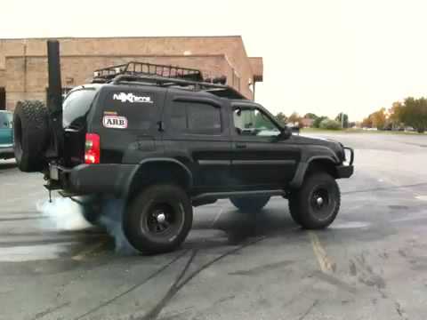 Nissan Xterra Burn out with 35's - YouTube