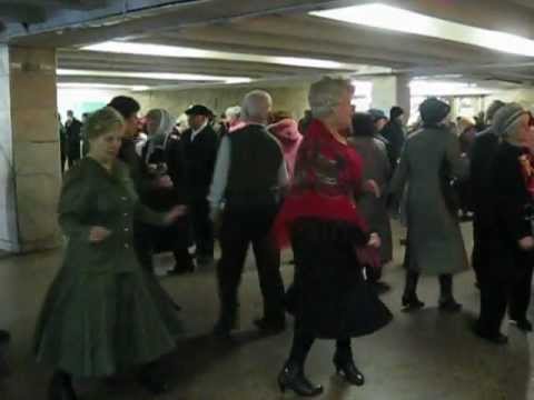 Older people are dancing on Teatralna subway station in Kyiv, Ukraine