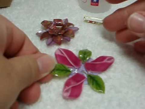 A quick video to show you how to make a cute flower pin out of paper flowers