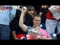 Fan grabs foul ball while holding his child