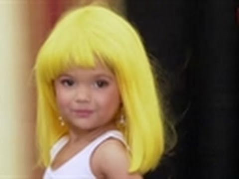  A toddler is dressed up as Julia Roberts' character from Pretty Woman