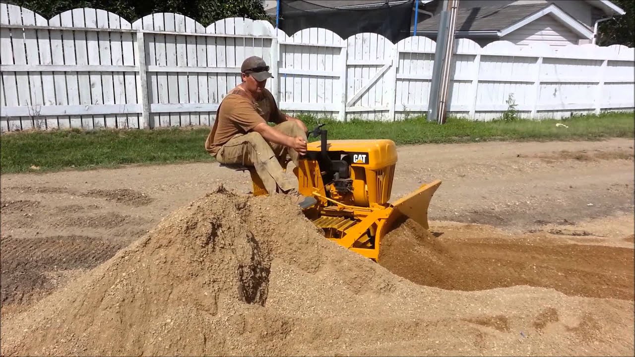 CAT Mini Dozer Pushing Dirt YouTube